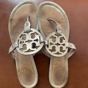 Well loved gold Tory Burch Millers